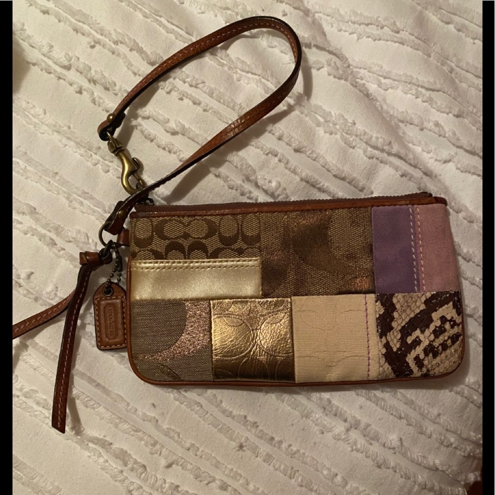 Multi patched Coach wristlet